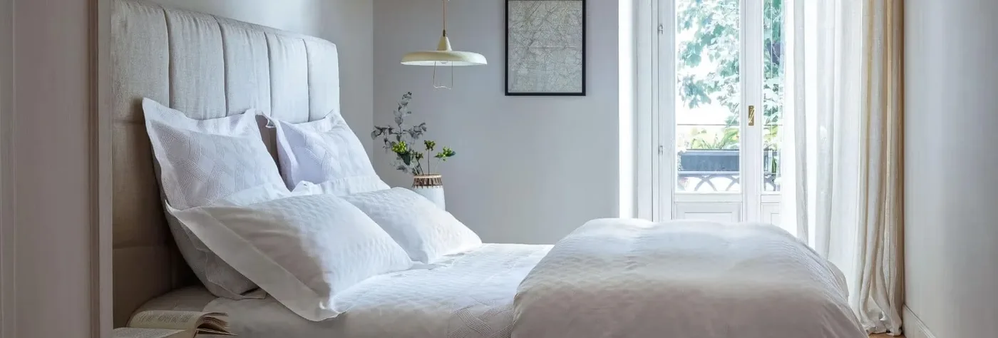 Stored Frette bed linens protected from mold and mildew by Alex's Dry Cleaning Valet