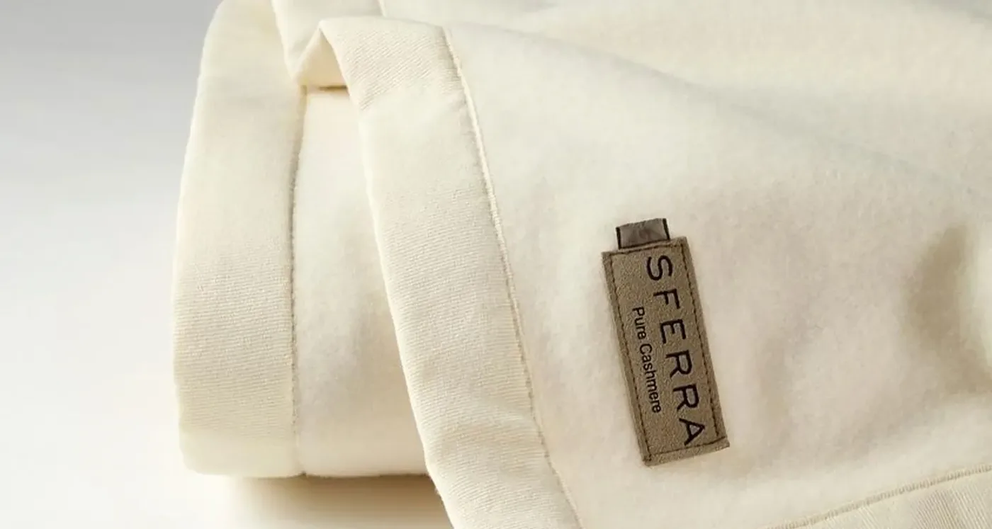 Sferra blanket safeguarded against mildew during storage by Alex's Dry Cleaning Valet