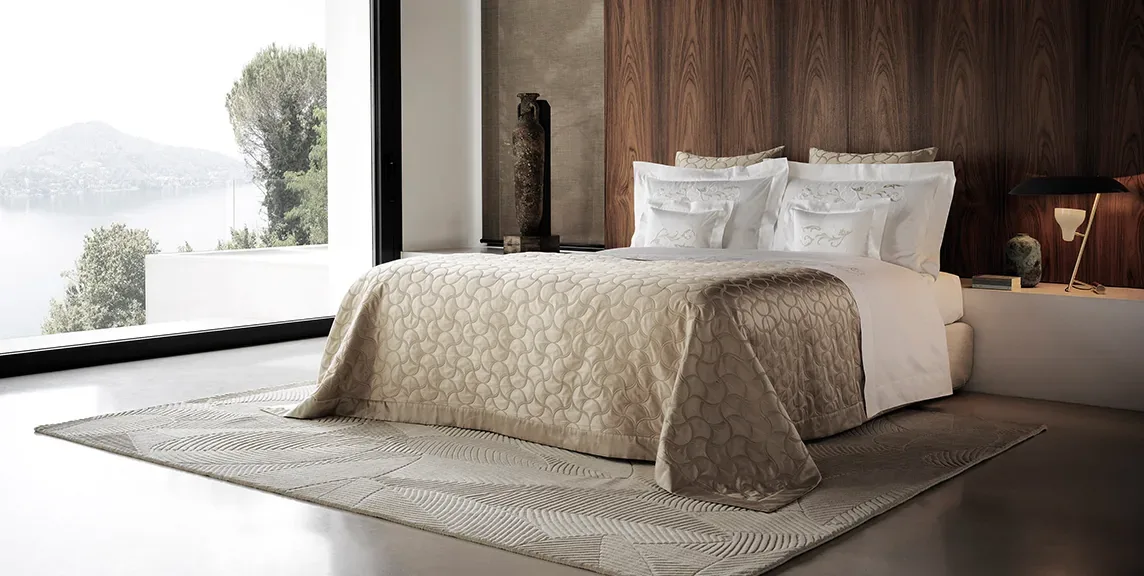 Frette bed linens restored after water damage by Alex's Dry Cleaning Valet